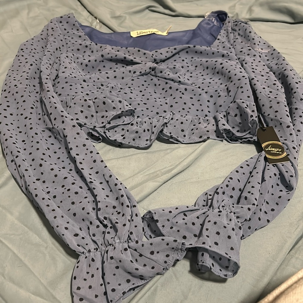 Blue cropped dressy long sleeve never worn, tag is still attached